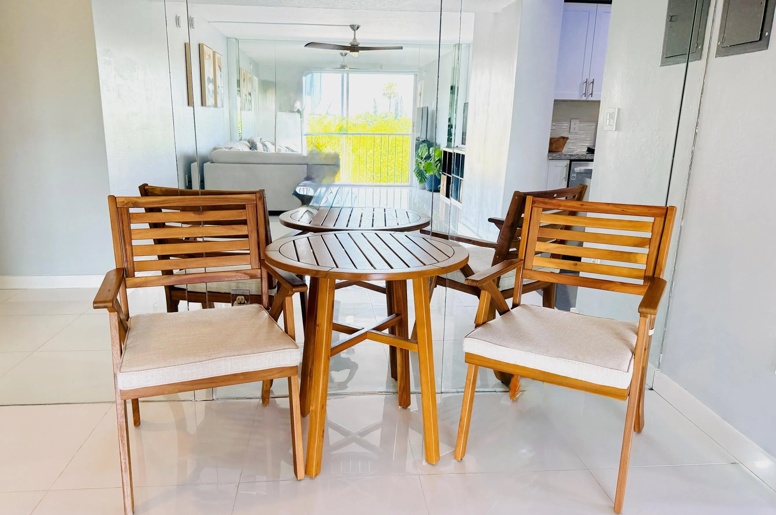 Dining area with custom mirrors for extra light