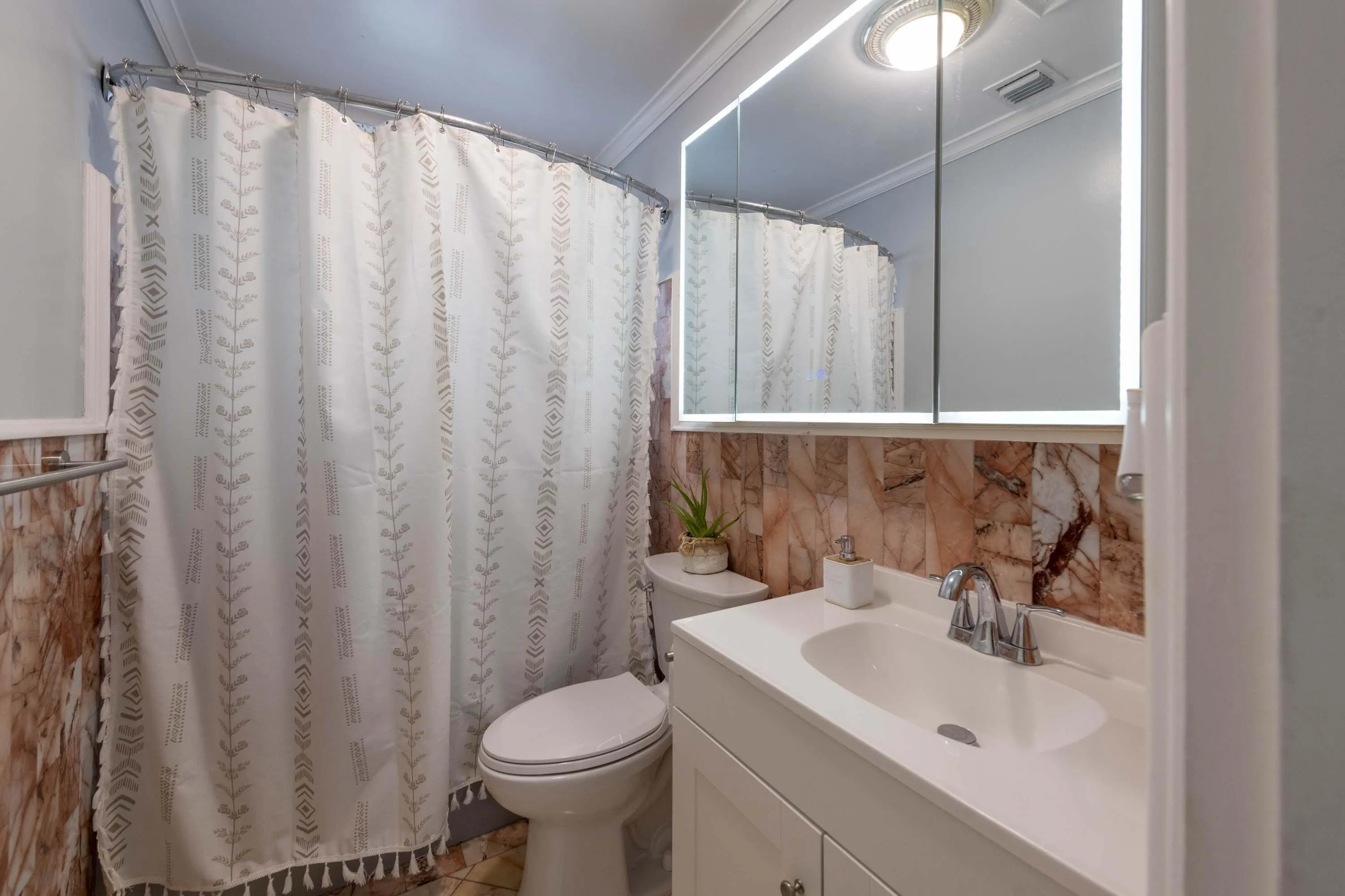 First bathroom with Marble tiles