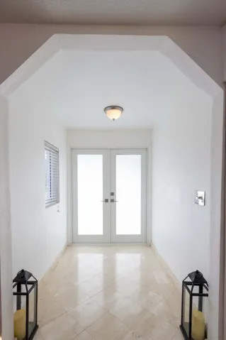 Main entrance impact door