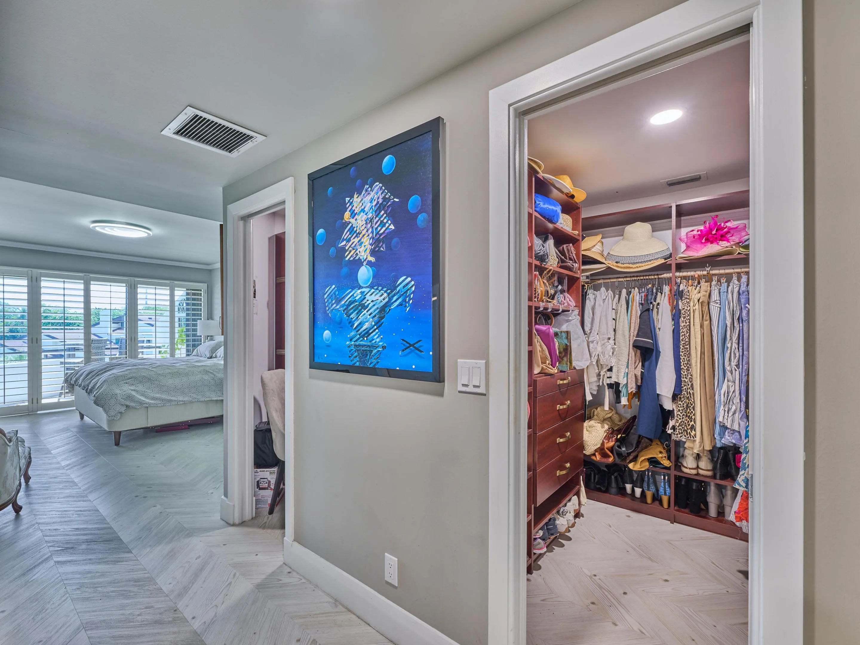 Master Suite to Balcony - closets open