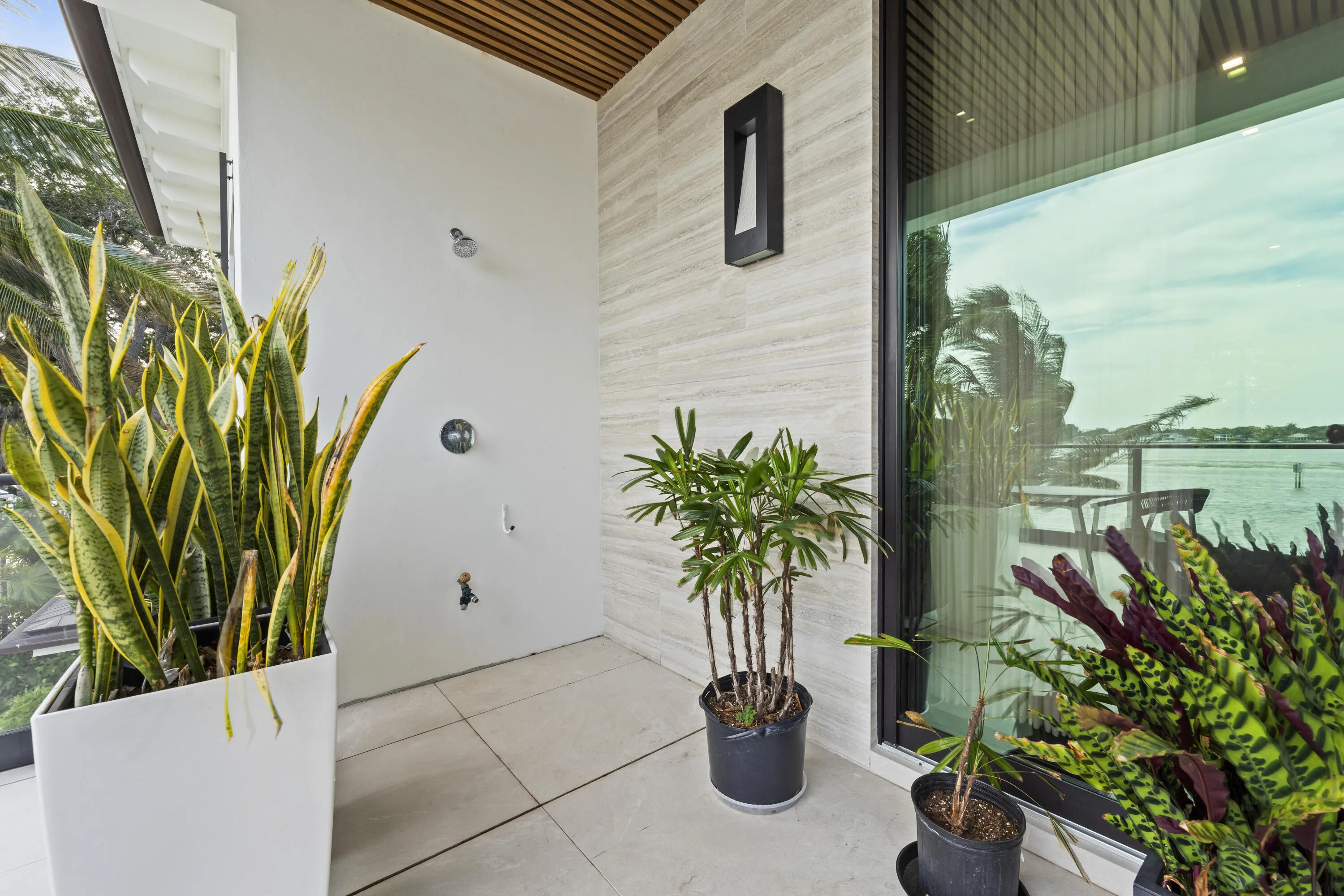 Outdoor shower off priamry baclony