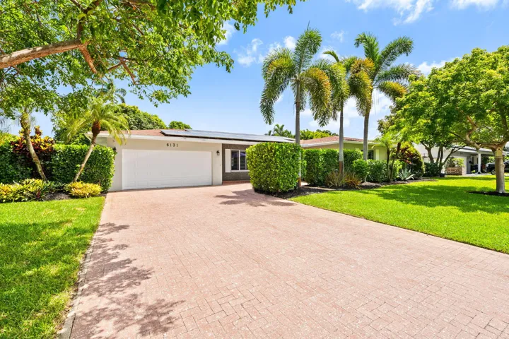 Ample parking in driveway or street! 2 car garage converted