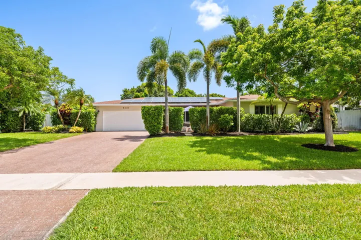 Updated patio home on tree lined street