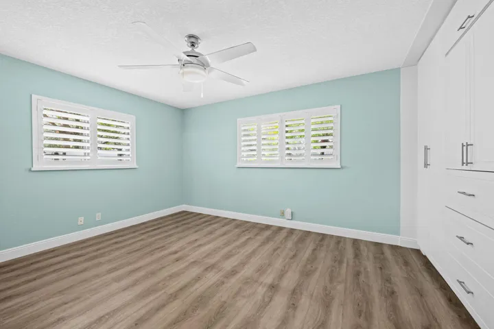 Master Bedroom with built in drawers and closets. Separate closets also available to use nearby