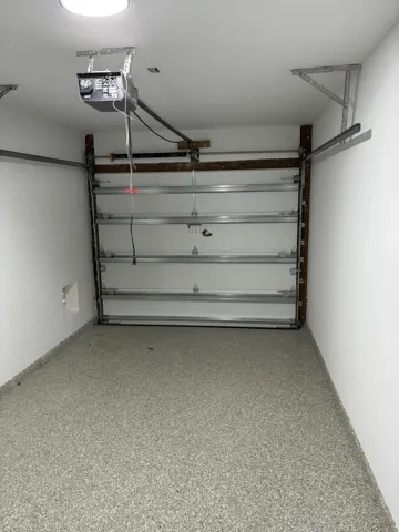 1-car garage (with 1 extra SS fridge that is not shown on the photo)