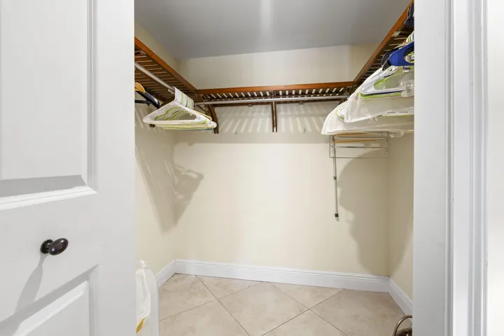 Walk in closet in primary bedroom