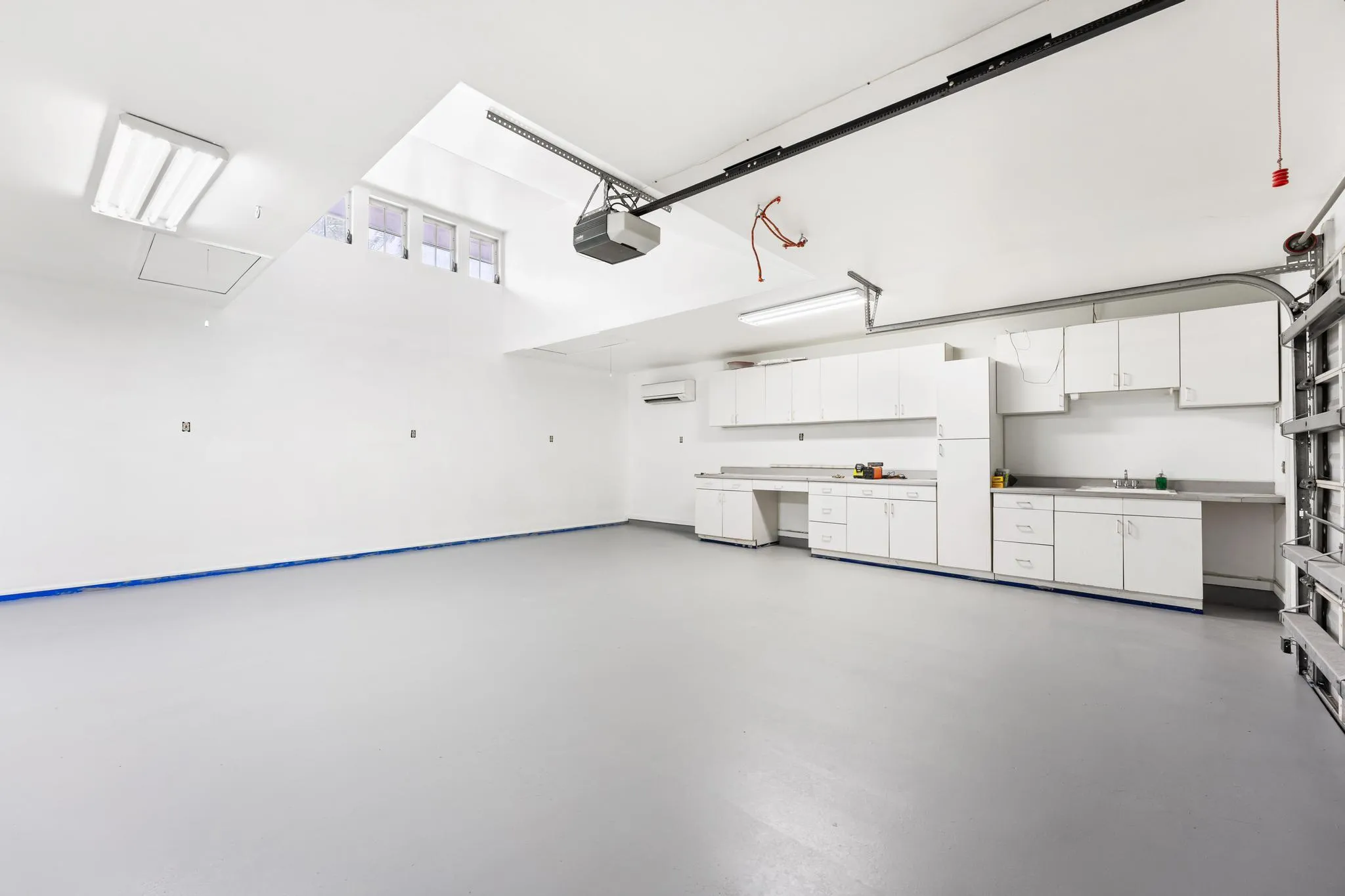2nd 2-car garage with built-in shelving, plumbing and sink. Access to bathroom available