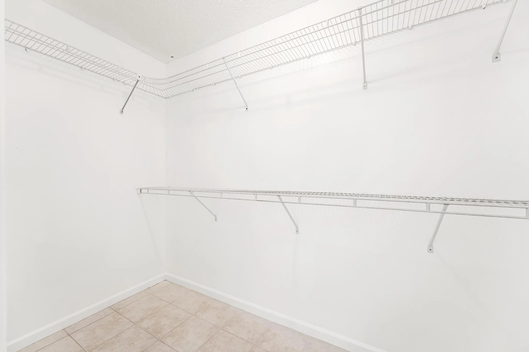 Primary suite walk-in closet #1