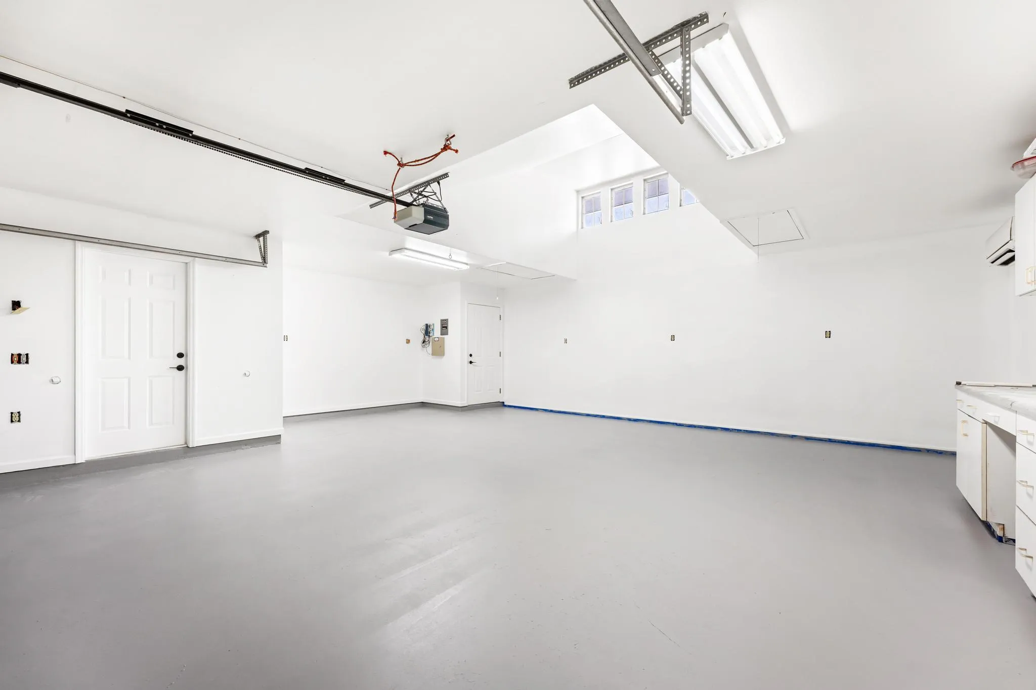 2nd 2-car garage with built-in shelving, plumbing and sink. Access to bathroom available