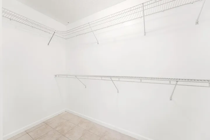 Primary suite walk-in closet #1