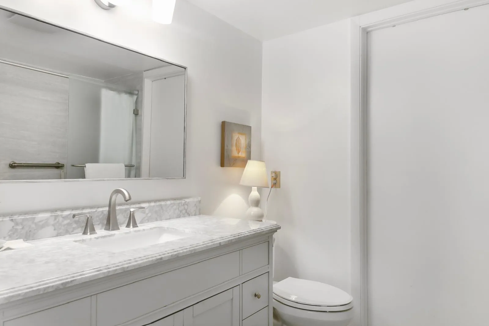 Looking at the master bath from inside the master room.