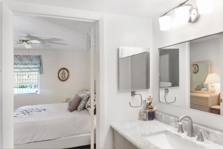 Looking at the master room from inside of the master bath.