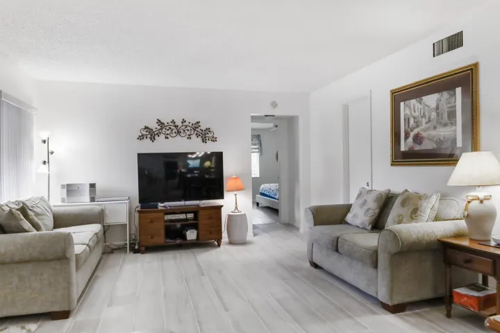 Living room. At the end, master room door and it is open.