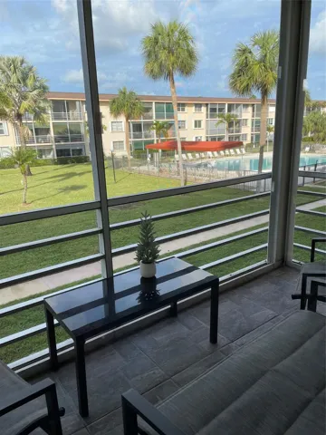 Screened patio with large format tile flooring