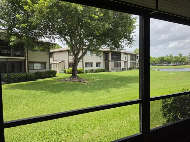 Serene View of Patio from Screened-in Patio