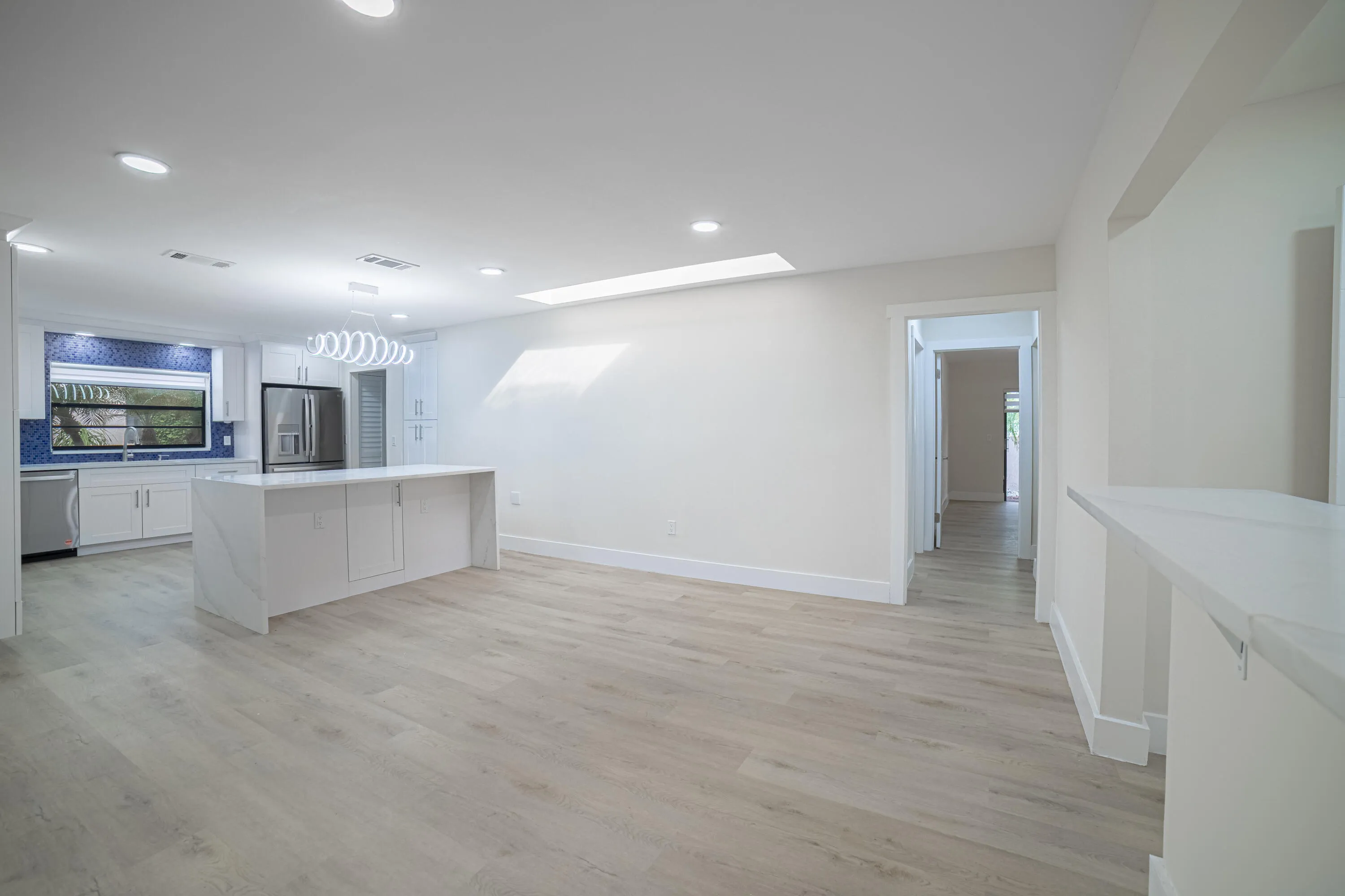 dining area space with a skylight