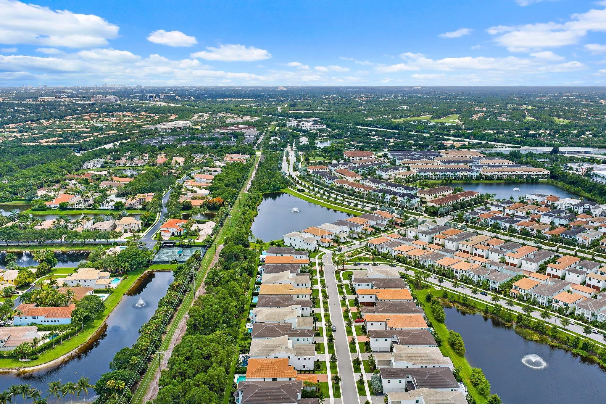 Wide aerial view of the surrounding waterfront community