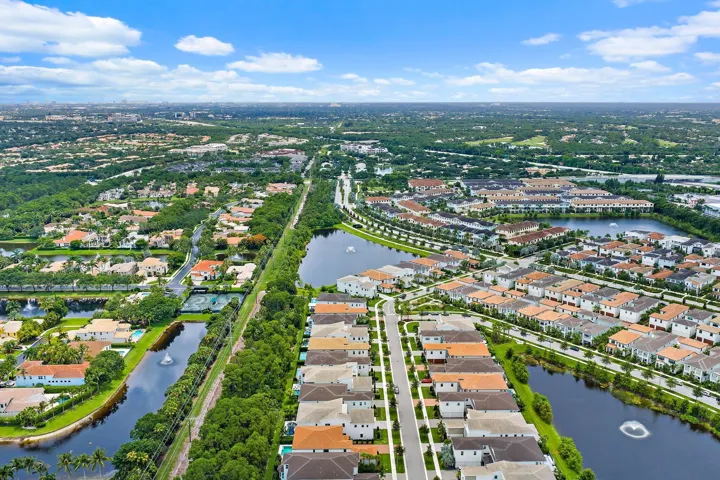 Wide aerial view of the surrounding waterfront community