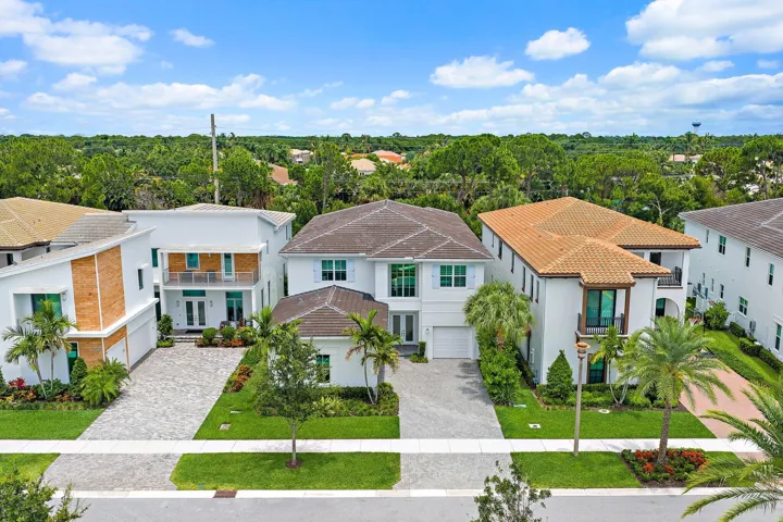 Aerial street view of the home and surrounding neighborhood