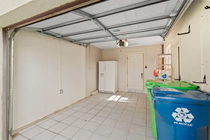 1 car garage with a new modern WIFI garage door opener motor and camera.