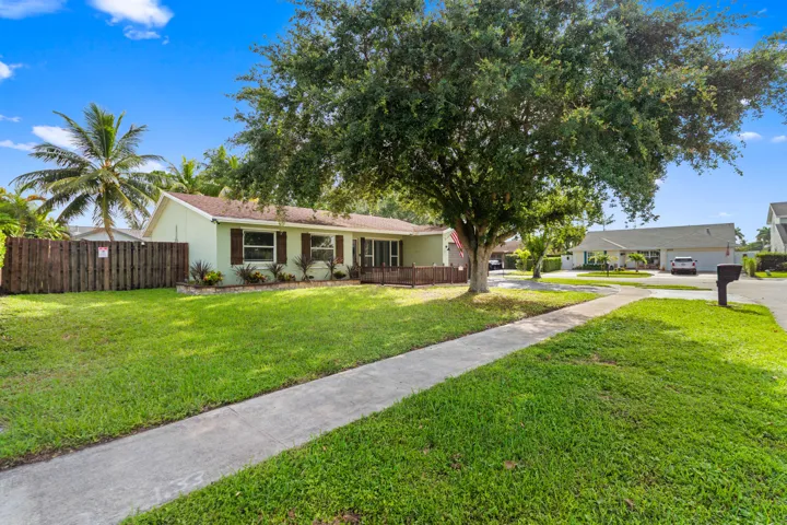 Oversized corner lot with room for a boat, RV, camper & recreational vehicles.