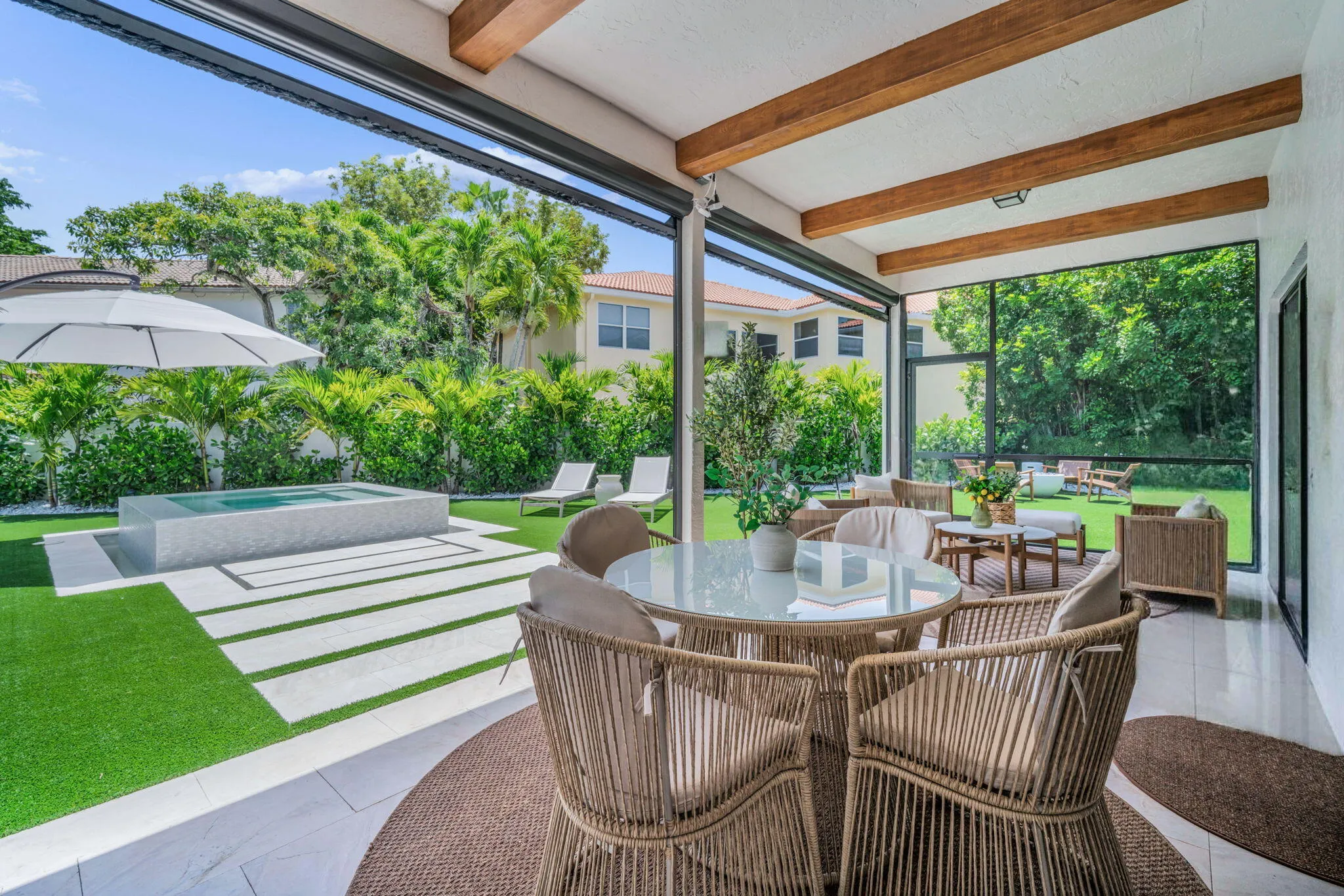 Screened patio with exposed wood beams