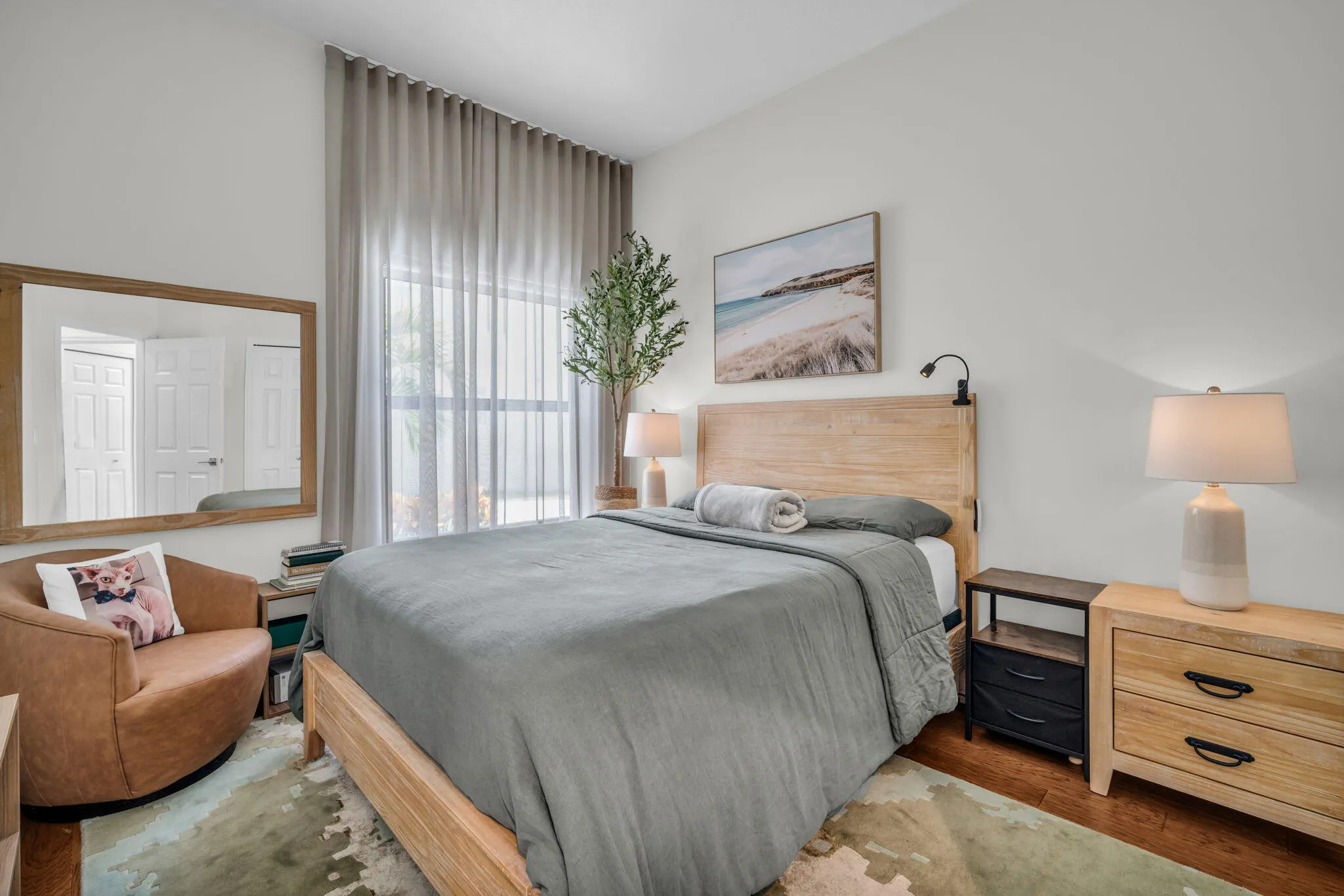 High ceilings with full-height window treatments