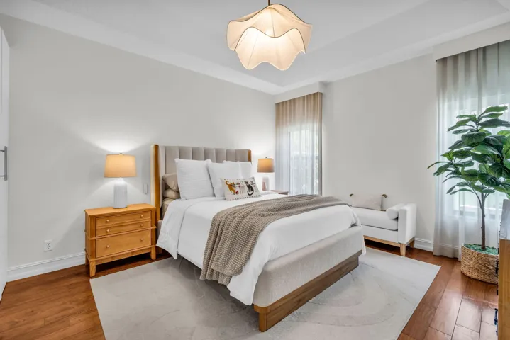 Recessed tray ceiling with a contemporary pendant light fixture