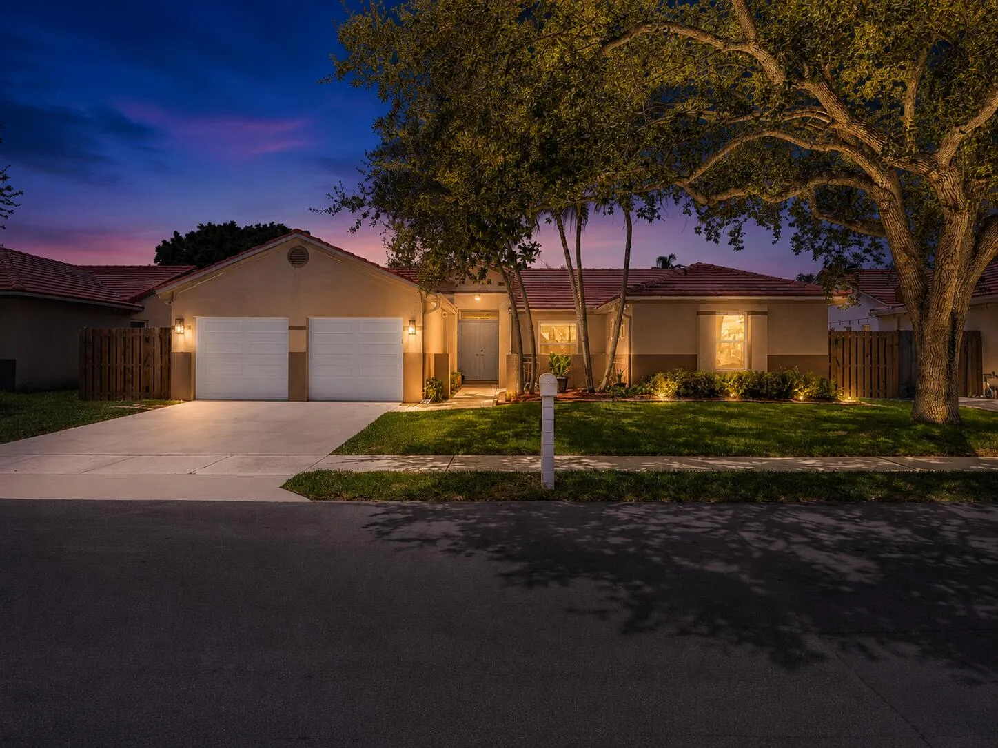 Twilight - Front of House with 2 Car Garage - Virtual Lighting