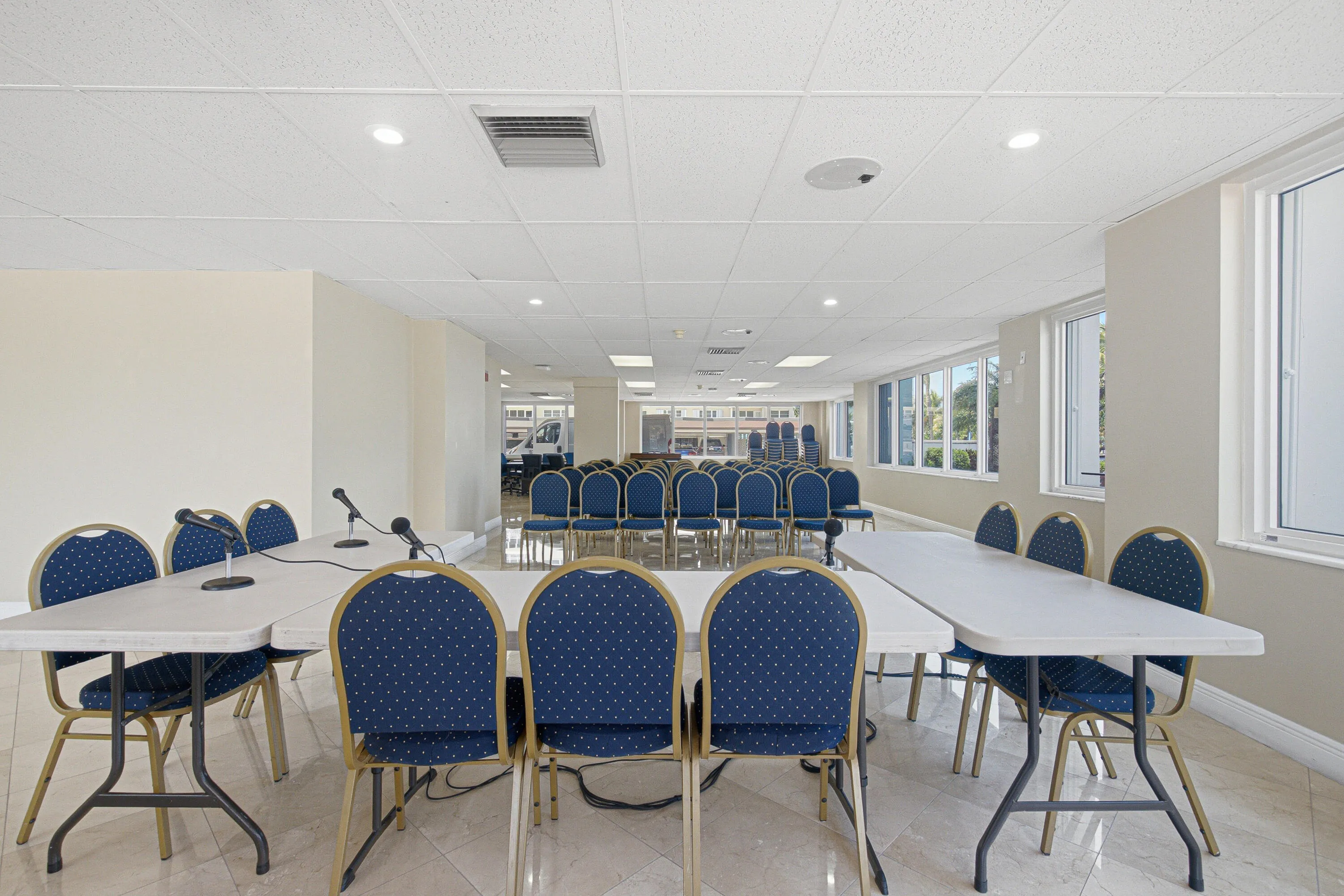 Community room can be configured with 10-top rounds and banquet chairs for your soirees