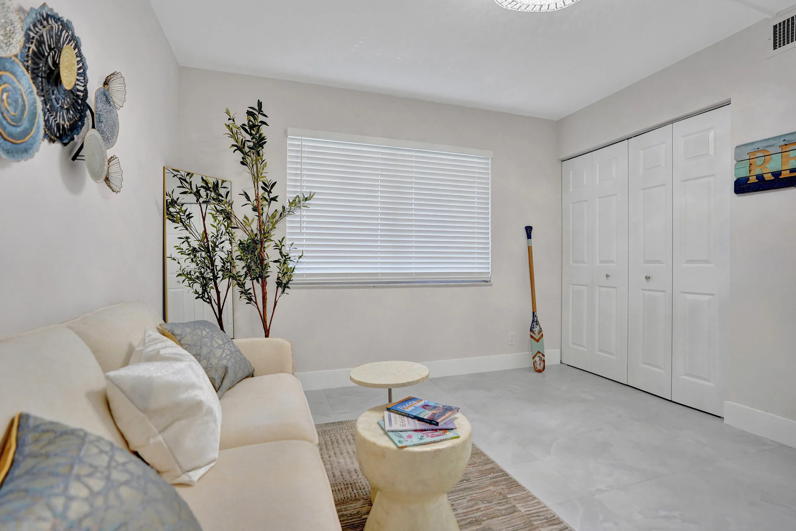 Guest bedroom has a spacious closet.