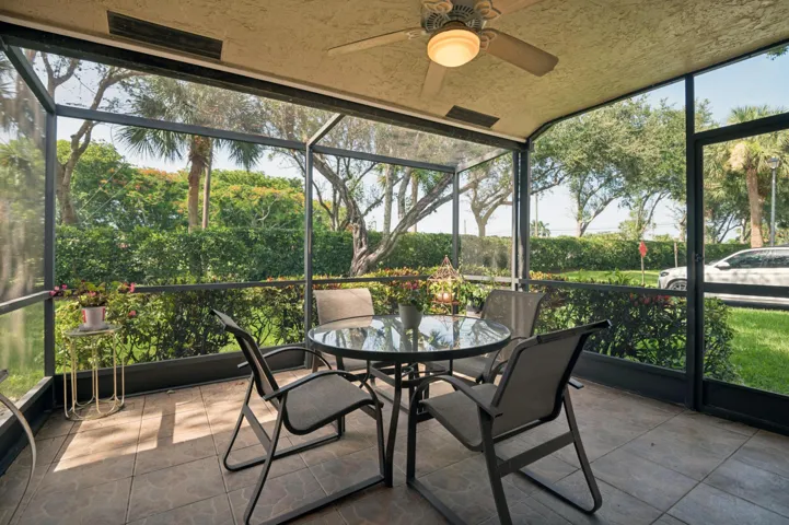 Screened and tiled patio