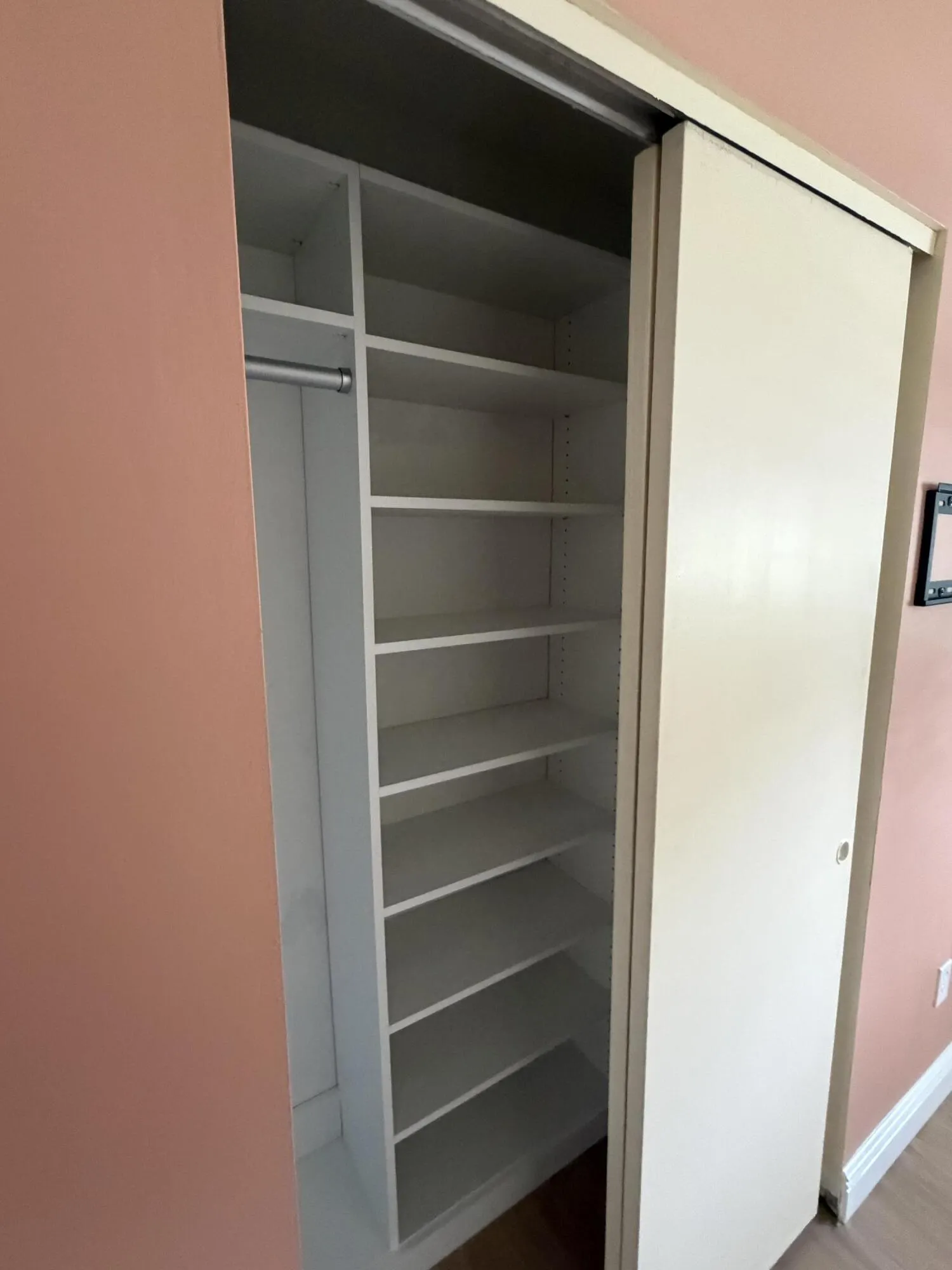 Primary bedroom built in closet systems
