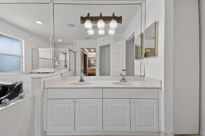 Primary bath with dual sinks.