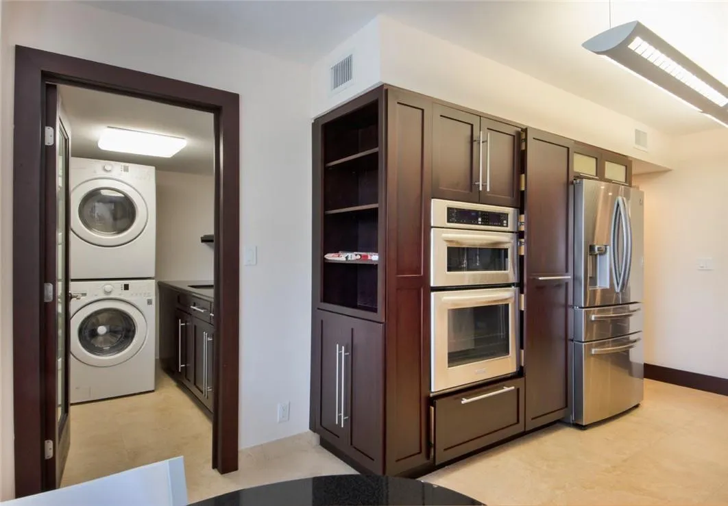 Laundry room adjacent to the the kitchen.