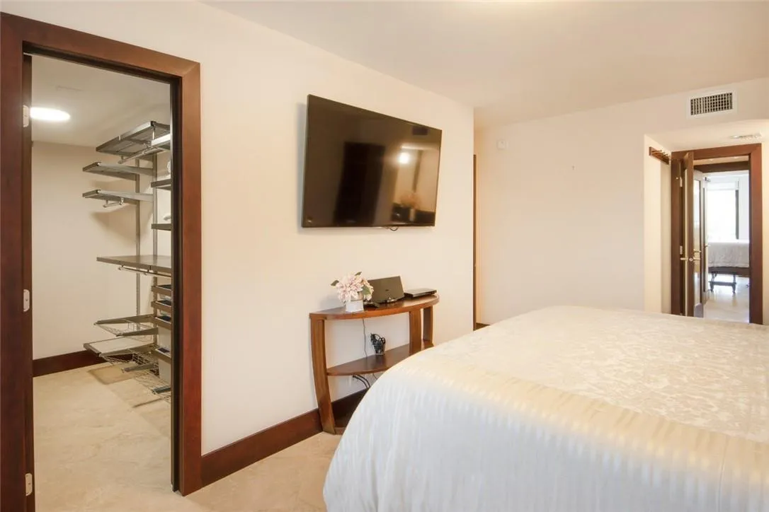 Bedroom # 3. Far right is the door to the bathroom that is shared with bedroom #2