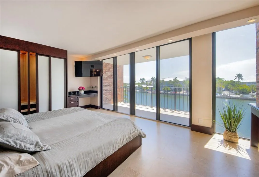 Master bedroom, one of the 3 bedrooms with kings size bed, desk, large customized closets.