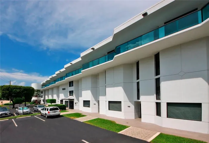 View from the street and the parking lot. Access to the building is only with key fobs.