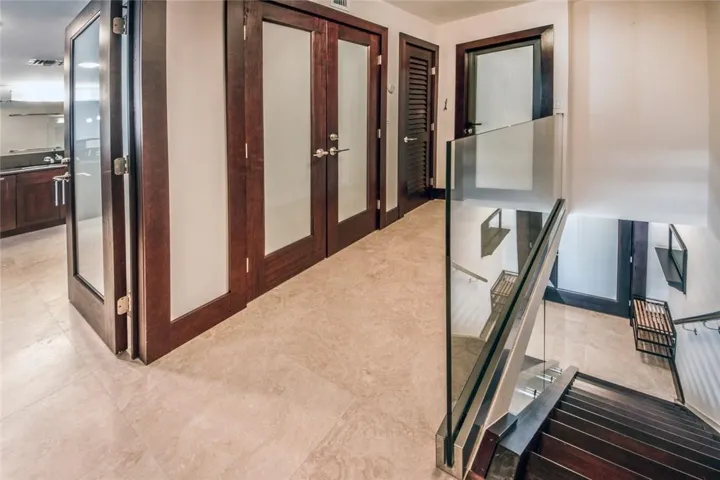 Stairs leading up to the 3rd level where the master bedroom is located.