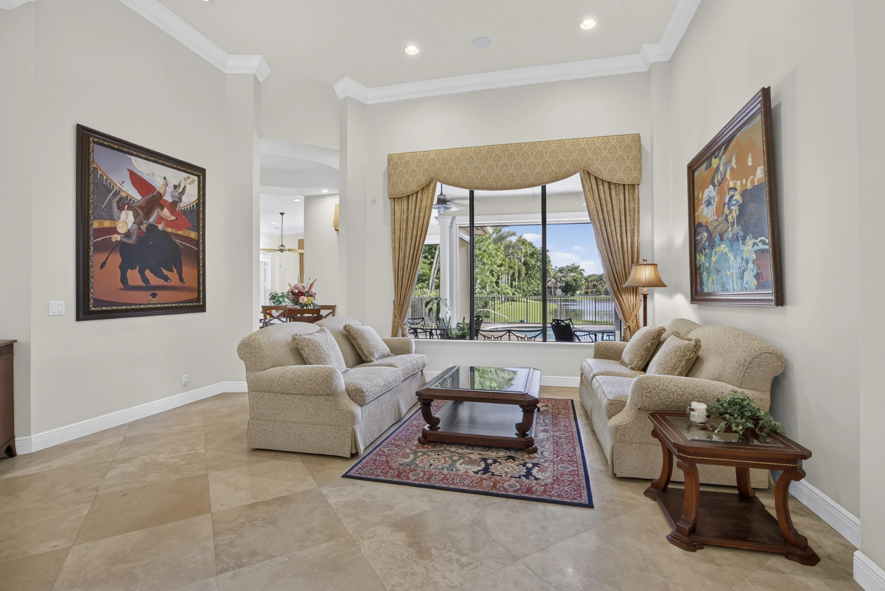 Living Room overlooking pool and long lake view