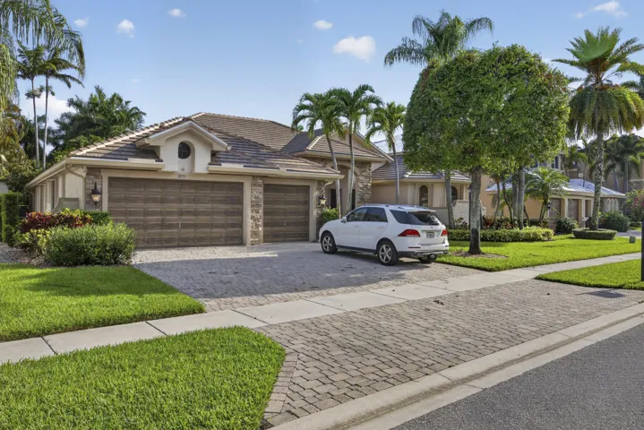 Expansive Driveway/ Garage can fit up to 9 cars