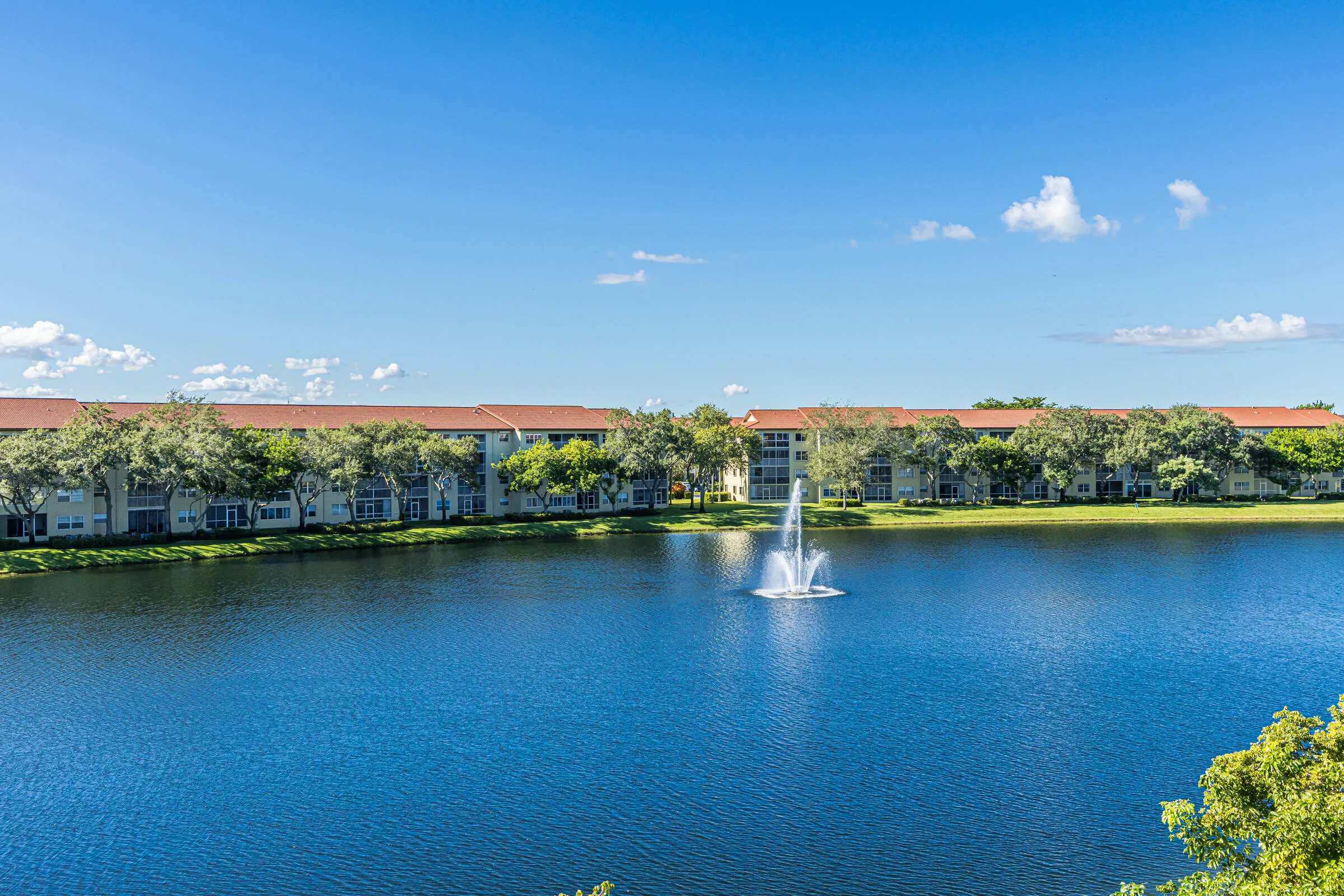 Wide Lake views from extended balcony, living area & Master Bedroom