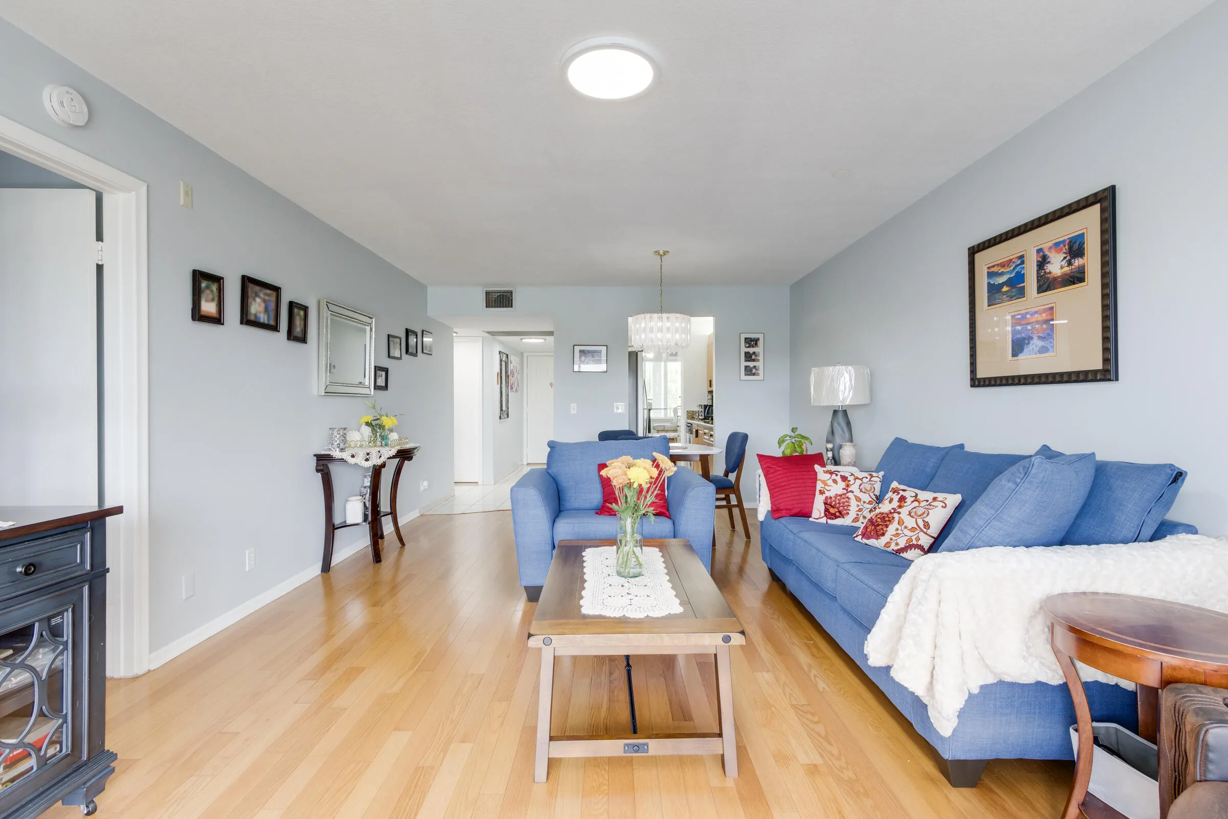 Wood flooring throughout living area.