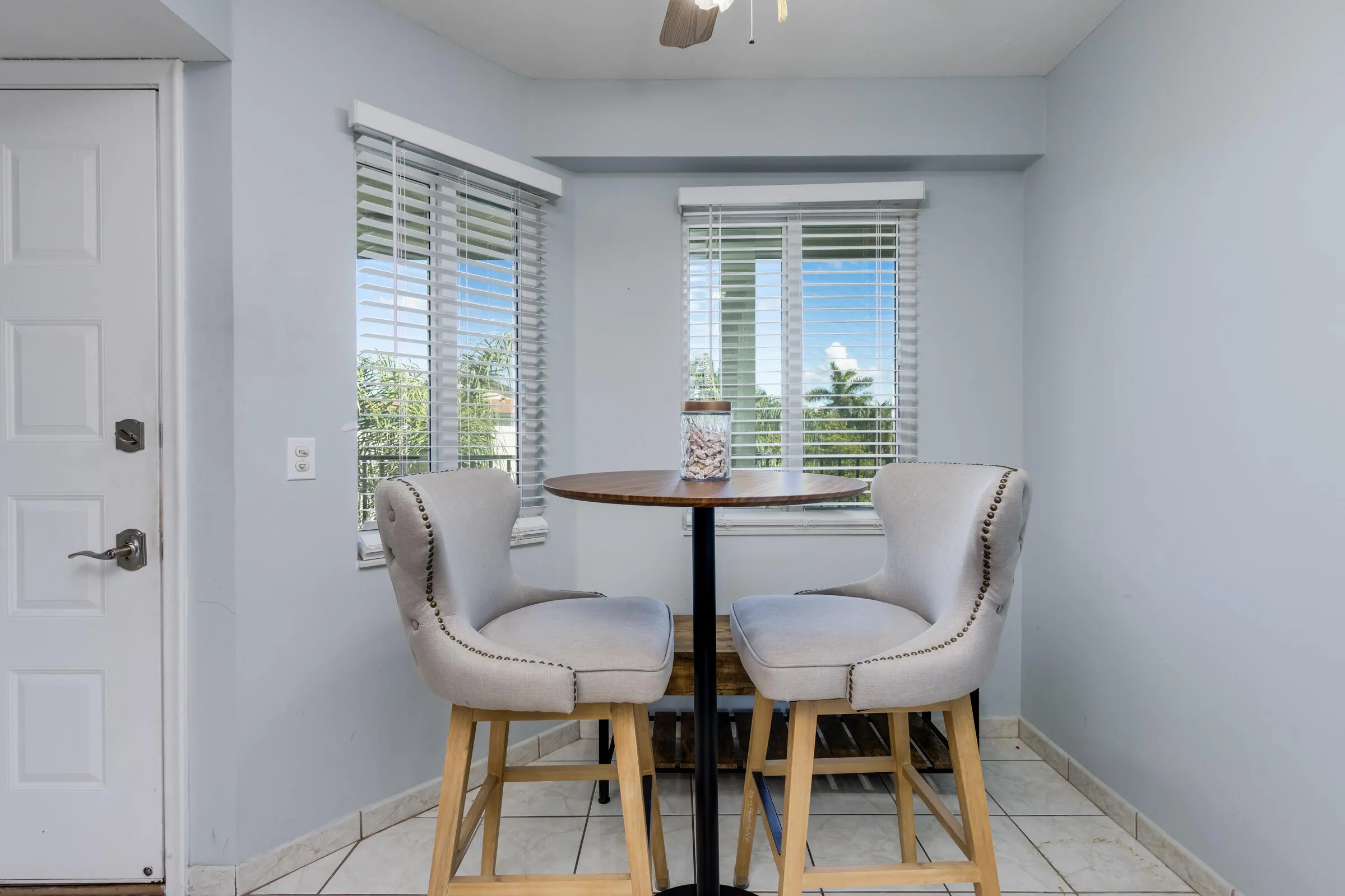 Tiled flooring in breakfast area, kitchen and foyer.