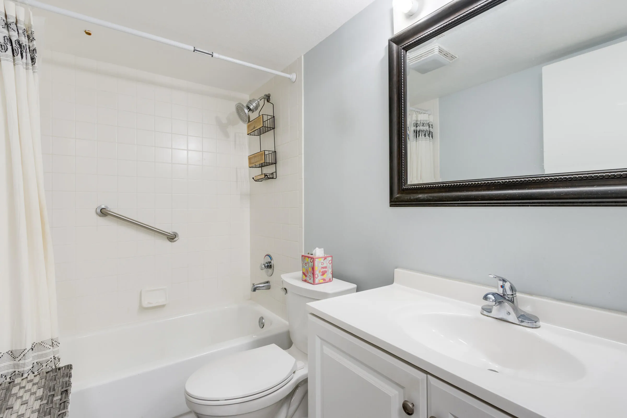 2nd bathroom complete with combination tub and shower. Large Vanity & mirror.