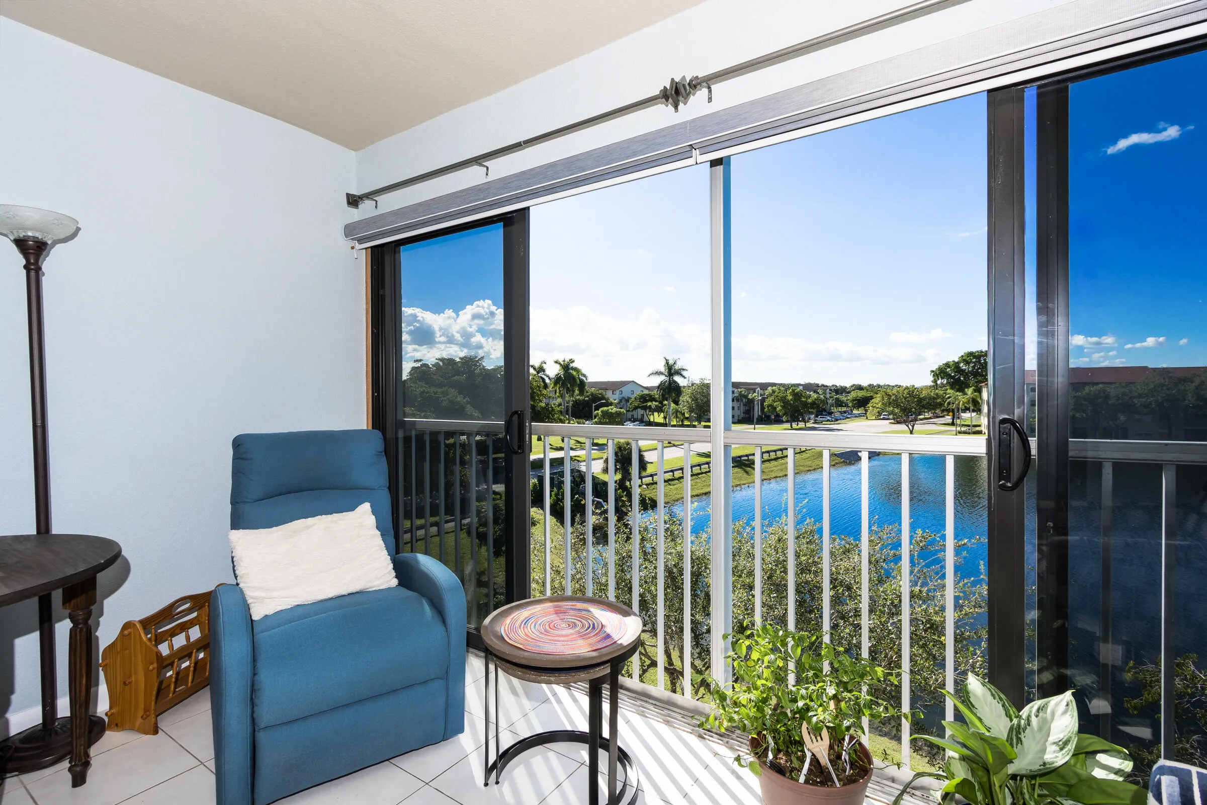 The extended balcony offers relaxation & calming views of the wide lakefront location.