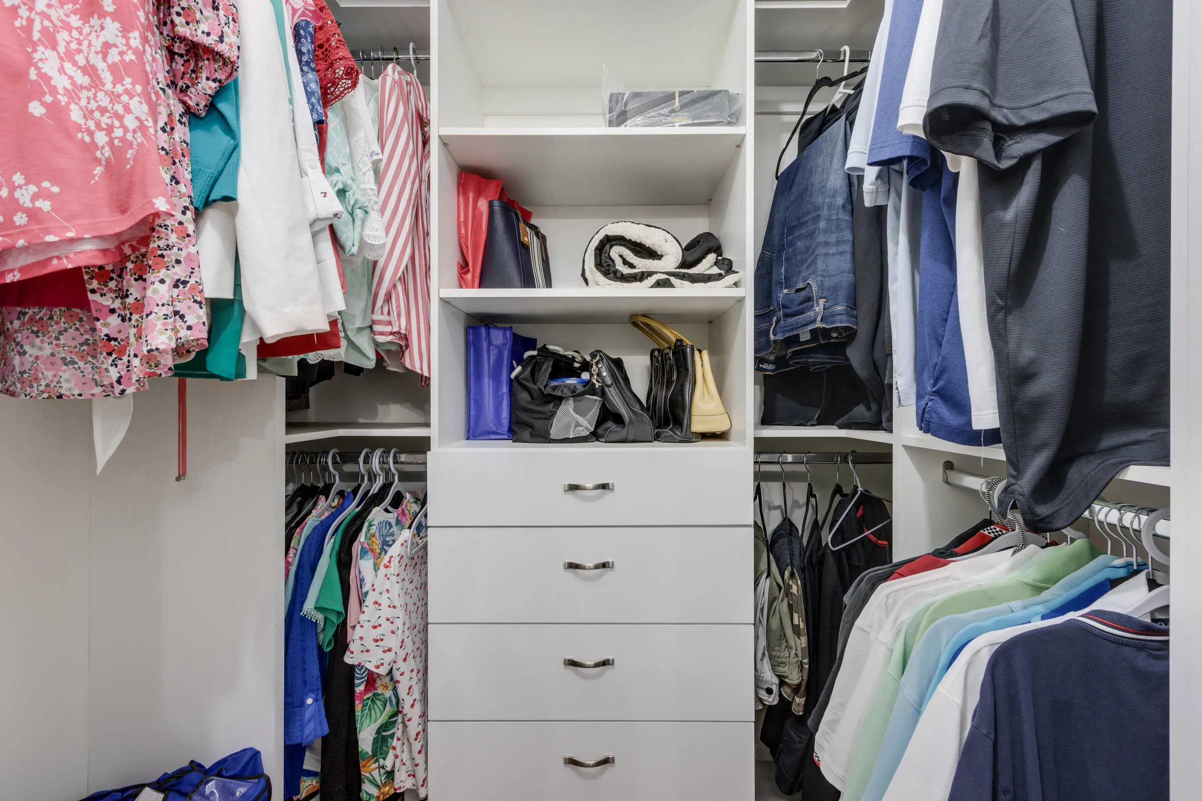 Customized Walk-in Closet (double hung) with pull out draws, and shelving
