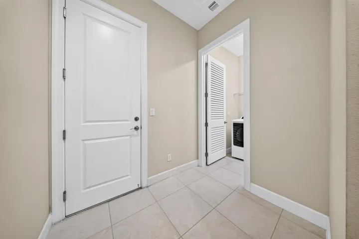 This entry way space from the garage is perfect for shoes,Drop area.