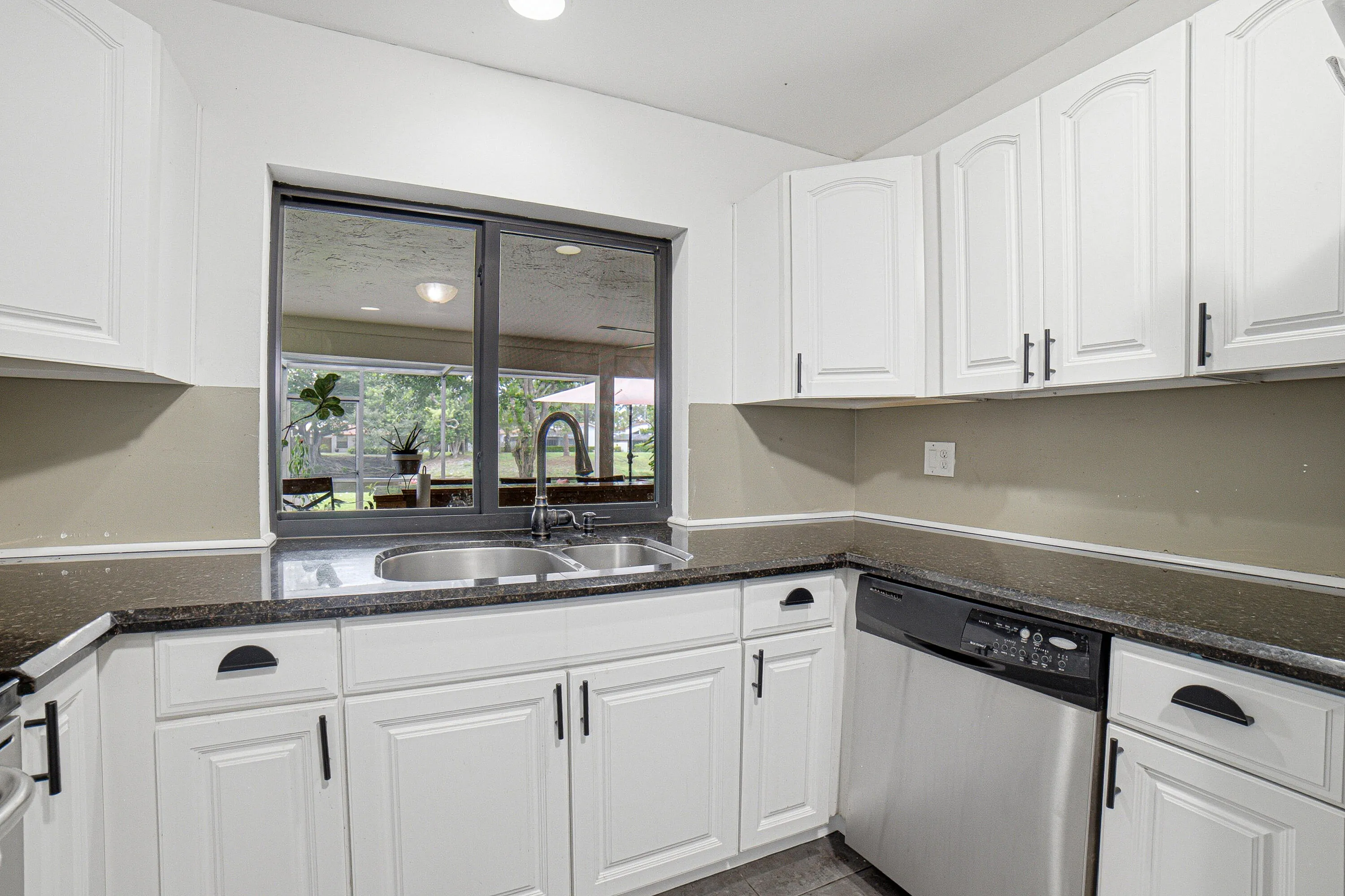 Windows throughout home have been upgraded with the highest quality of materials. You can remove screens and pass the steaks through this window for the grill!