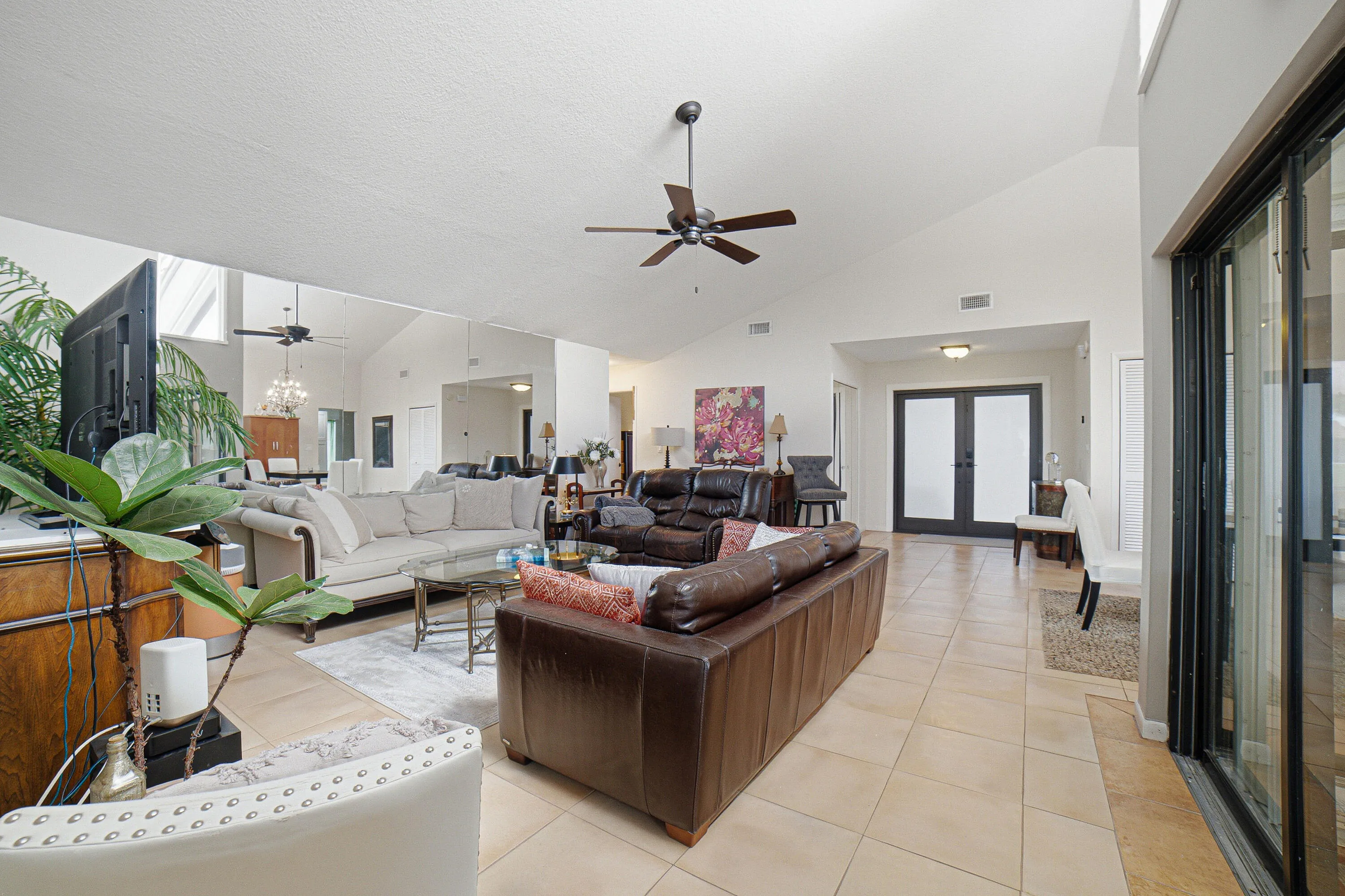 View of the open living room from the master bedroom. This is a true single level CBS home. No step-downs anywhee.